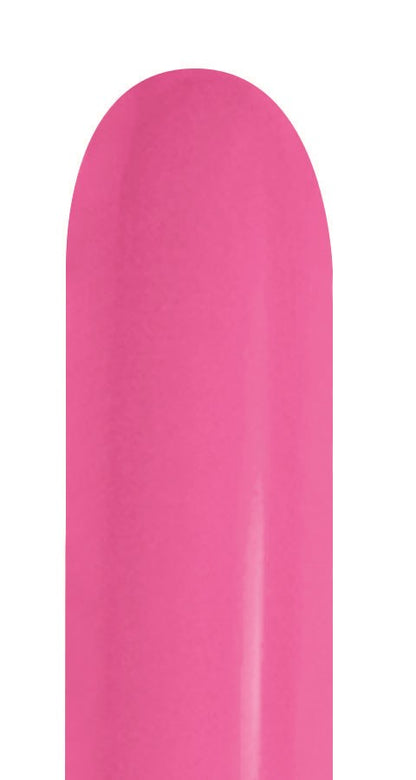 Long, narrow, bright fuchsia latex balloon with a smooth surface and rounded tip.